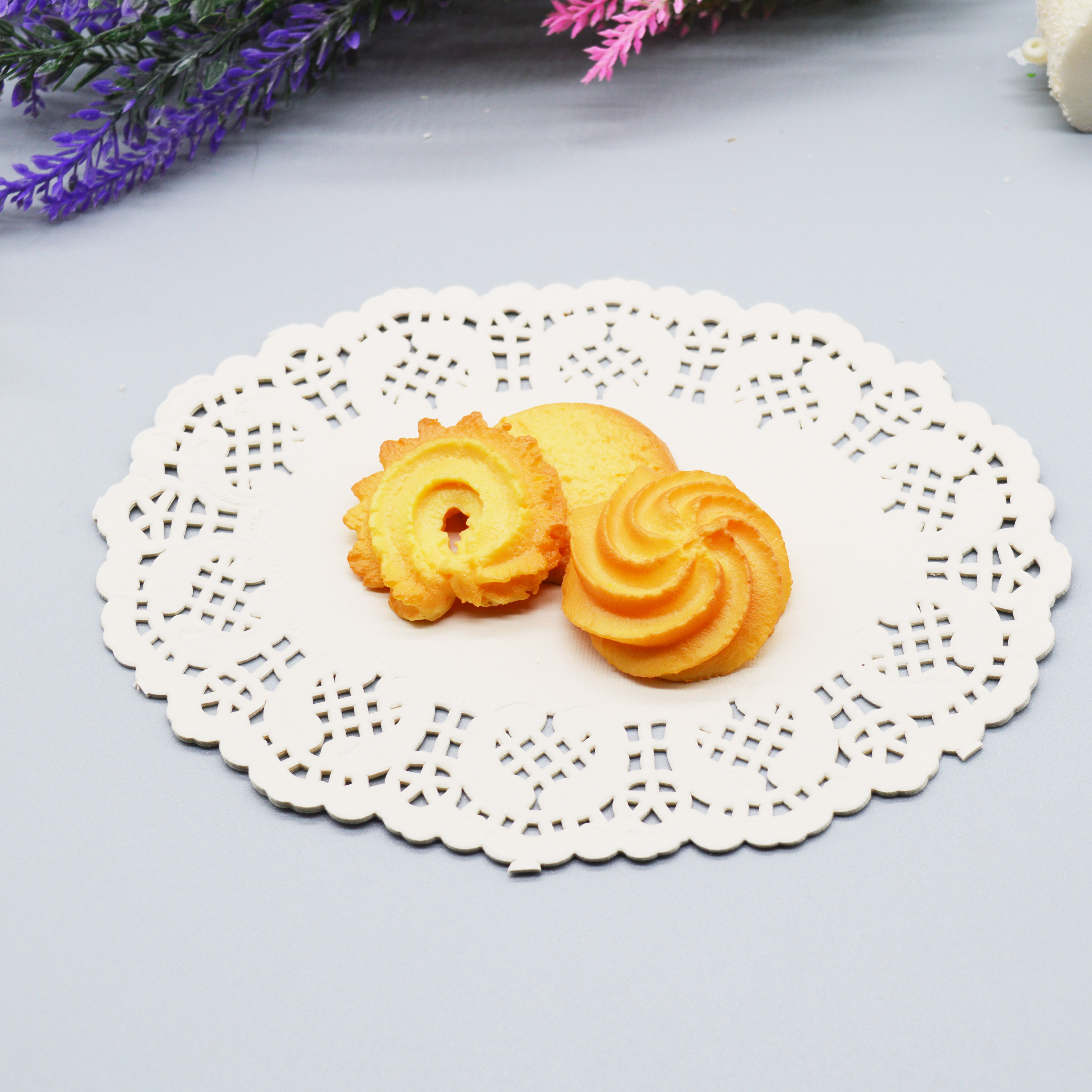 Food-grade paper doily displayed with bakery products